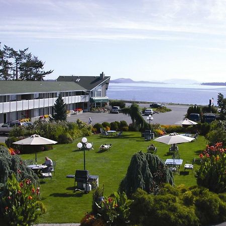 The Cedarwood Inn & Suites Sidney Bagian luar foto